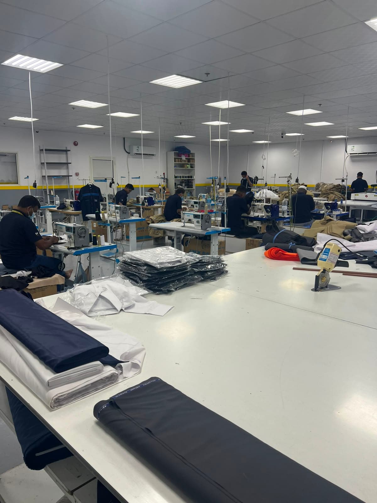 Corporate uniform display at Amal Uniforms showroom